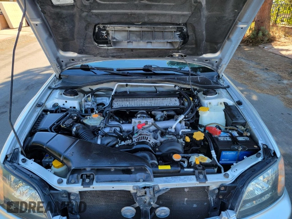 2005 Subaru Baja Turbo z VIN 4S4BT63C956106083, wystawiony jako Copart lot #45593235 z przebiegiem 205 561 mil mil oraz Szkoda całkowita • Salvage title. Historia ofert i sprzedaży dostępna na DreamBid. Obrazek 7.