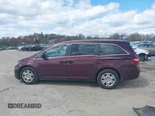 2013 Honda Odyssey LX with VIN 5FNRL5H28DB058401, listed as a IAAI auction lot 42050892 with 221,016 mi miles and . Bid and sale history available at carsss.com. Image 14.