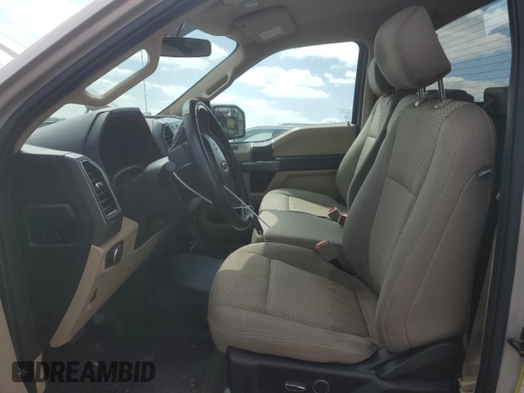 2018 Ford F-150 XL with VIN 1FTMF1E5XJKE35365, listed as a Copart auction lot 51152095 with 49,572 mi miles and Salvage title. Bid and sale history available at DreamBid. Image 7.