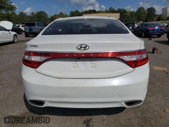 2014 Hyundai Azera с VIN KMHFG4JG0EA352016, выставлен на аукционе Copart как лот 51609895 с пробегом 186 157 миль миль и Чистый • Clean title. История ставок и продаж доступна на DreamBid. Изображение 6.
