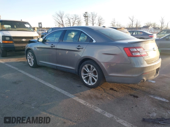 2013 Ford Taurus SEL with VIN 1FAHP2H82DG115528, listed as a IAAI auction lot 41319142 with 153,707 mi miles and . Bid and sale history available at DreamBid. Image 3.