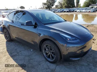 2024 Tesla Model Y with VIN 7SAYGDED3RF151031, listed as a Copart auction lot 49494165 with 7,503 mi miles and Salvage Title. Bid and sale history available at DreamBid. Image 4.