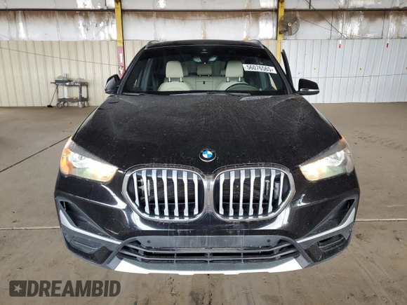 2021 BMW X1 sDrive28i z VIN WBXJG7C02M5S30154, wystawiony jako Copart lot #56076565 z przebiegiem 57 671 mil mil oraz Tytuł czysty. Historia ofert i sprzedaży dostępna na DreamBid. Obrazek 5.