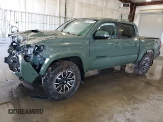 2021 Toyota Tacoma SR with VIN 3TMCZ5AN7MM437099, listed as a Copart auction lot 62932135 with 84,393 mi miles and Salvage title. Bid and sale history available at DreamBid. Image 1.