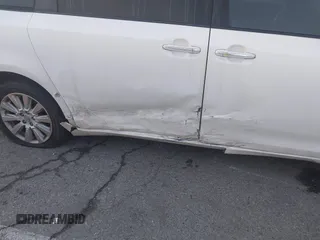2015 Toyota Sienna Ltd with VIN 5TDDK3DC8FS100841, listed as a IAAI auction lot 41539557 with 219,816 mi miles. Bid and sale history available at carsss.com. Image 6.