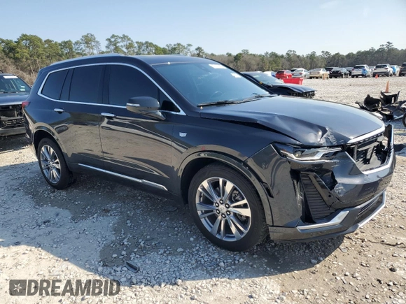 2022 Cadillac XT6 Premium Luxury with VIN 1GYKPCRS1NZ104567, listed as a Copart auction lot 47173005 with 54,541 mi miles and Clean Title. Bid and sale history available at carsss.com. Image 4.