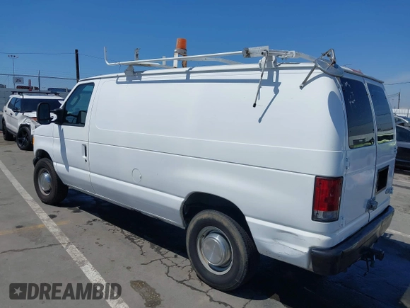 2006 Ford Econoline Cargo with VIN 1FTNE24L66HA64111, listed as a IAAI auction lot 41947445 with 205,025 mi miles and . Bid and sale history available at DreamBid. Image 3.