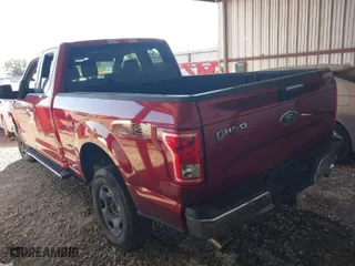 2015 Ford F-150 XLT with VIN 1FTFX1EF7FFA94960, listed as a IAAI auction lot 40268057 with 143,717 mi miles. Bid and sale history available at carsss.com. Image 3.