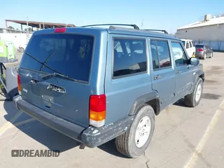 1998 Jeep Cherokee Sport with VIN 1J4FT68S0WL231959, listed as a IAAI auction lot 41680076 with 252,369 mi miles. Bid and sale history available at carsss.com. Image 4.