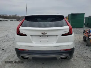 2021 Cadillac XT4 FWD Premium Luxury with VIN 1GYFZCR43MF032297, listed as a Copart auction lot 47379085 with 36,065 mi miles and Salvage Title. Bid and sale history available at DreamBid. Image 6.