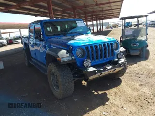 2021 Jeep Gladiator Rubicon z VIN 1C6JJTBGXML516164, wystawiony jako IAAI lot #41837544 z przebiegiem 48 197 mil mil oraz . Historia ofert i sprzedaży dostępna na DreamBid. Obrazek 1.