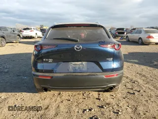 2022 Mazda CX-30 2.5 Turbo with VIN 3MVDMBAY8NM459690, listed as a Copart auction lot 84376874 with 24,723 mi miles and Salvage Title. Bid and sale history available at DreamBid. Image 6.
