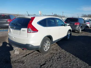 2014 Honda CR-V EX with VIN 5J6RM4H5XEL118320, listed as a IAAI auction lot 41596175 with 95,501 mi miles. Bid and sale history available at carsss.com. Image 4.