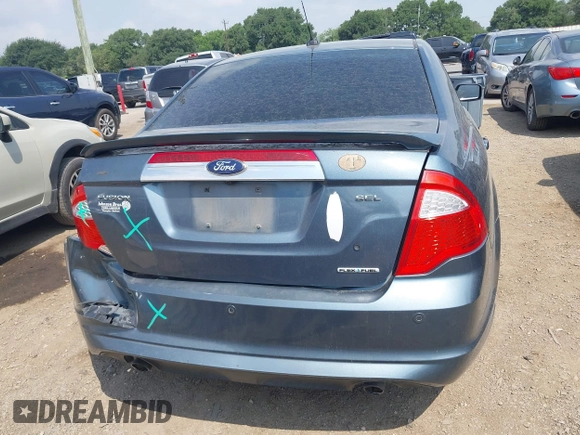 2012 Ford Fusion SEL z VIN 3FAHP0JG3CR286320, wystawiony jako IAAI lot #42159555 z przebiegiem 184 128 mil mil oraz . Historia ofert i sprzedaży dostępna na DreamBid. Obrazek 16.
