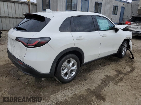 2023 Honda HR-V LX with VIN 3CZRZ1H37PM735335, listed as a Copart auction lot 58957705 with 21,203 mi miles and Salvage title. Bid and sale history available at DreamBid. Image 3.
