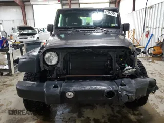 2017 Jeep Wrangler Sport z VIN 1C4AJWAG4HL726714, wystawiony jako Copart lot #57462995 z przebiegiem 34 940 mil mil oraz Szkoda całkowita • Salvage title. Historia ofert i sprzedaży dostępna na DreamBid. Obrazek 5.
