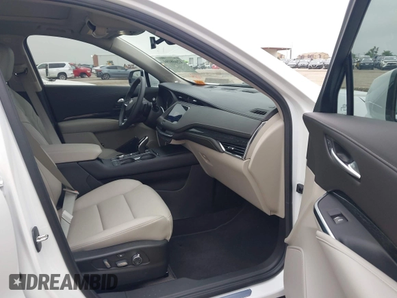 2023 Cadillac XT4 FWD Premium Luxury with VIN 1GYFZCR49PF225817, listed as a IAAI auction lot 42408494 with 5,977 mi miles and . Bid and sale history available at DreamBid. Image 5.
