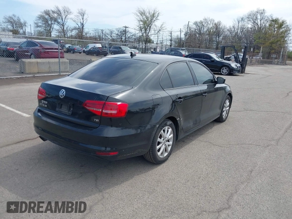 2015 Volkswagen Jetta Sedan 1.8T SE with VIN 3VWD17AJ0FM218263, listed as a IAAI auction lot 42083017 with 194,850 mi miles. Bid and sale history available at carsss.com. Image 4.