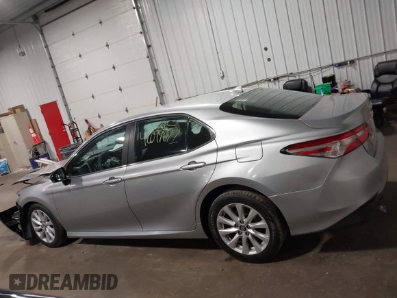 2019 Toyota Camry LE z VIN 4T1B11HK5KU814007, wystawiony jako IAAI lot #42099677 z przebiegiem 91 779 mil mil oraz . Historia ofert i sprzedaży dostępna na DreamBid. Obrazek 14.