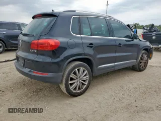 2012 Volkswagen Tiguan SE z VIN WVGAV7AX2CW575871, wystawiony jako Copart lot #58050865 z przebiegiem 96 569 mil mil oraz Szkody całkowita. Historia ofert i sprzedaży dostępna na DreamBid. Obrazek 3.