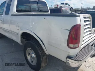 1997 Ford F-150 XL with VIN 1FTDX1868VKA12923, listed as a IAAI auction lot 41526986 with 343,755 mi miles. Bid and sale history available at carsss.com. Image 6.