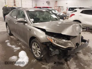 2017 Kia Optima LX with VIN 5XXGT4L33HG148897, listed as a IAAI auction lot 41565592 with 61,471 mi miles and . Bid and sale history available at carsss.com. Image 1.