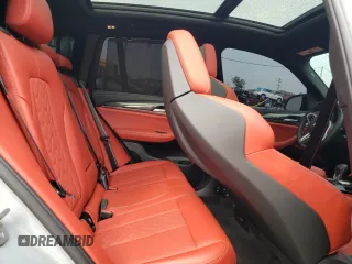 2022 BMW X3 M with VIN 5YM13EC0XN9J56822, listed as a Copart auction lot 49873974 with 7,396 mi miles and Salvage Title. Bid and sale history available at carsss.com. Image 11.