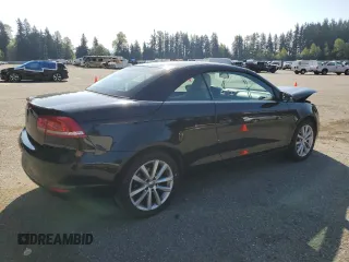 2012 Volkswagen Eos Komfort with VIN WVWBW7AH0CV001922, listed as a Copart auction lot 54378035 with 95,960 mi miles and Salvage Title. Bid and sale history available at DreamBid. Image 3.