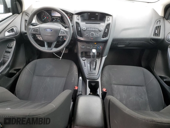 2016 Ford Focus SE with VIN 1FADP3F21GL284681, listed as a Copart auction lot 51140975 with 141,704 mi miles and Salvage Title. Bid and sale history available at DreamBid. Image 8.