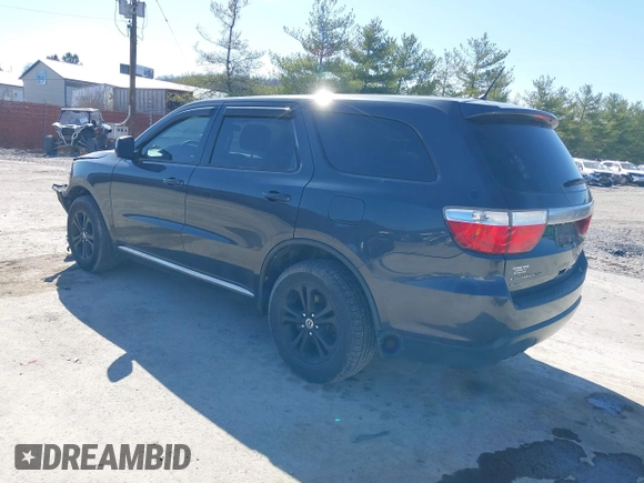 2013 Dodge Durango SXT with VIN 1C4RDJAG2DC530407, listed as a IAAI auction lot 41837441 with 133,375 mi miles and . Bid and sale history available at DreamBid. Image 3.