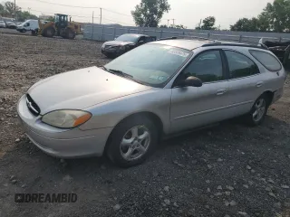 2003 Ford Taurus SE Standard with VIN 1FAFP58213A253776, listed as a Copart auction lot 60639475 with 77,421 mi miles and Salvage title. Bid and sale history available at DreamBid. Image 1.