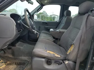 2003 Ford F-150 XL с VIN 1FTRX17273NB20966, выставлен на аукционе Copart как лот 53798005 с пробегом 217 855 миль миль и Списание • Salvage title. История ставок и продаж доступна на DreamBid. Изображение 7.