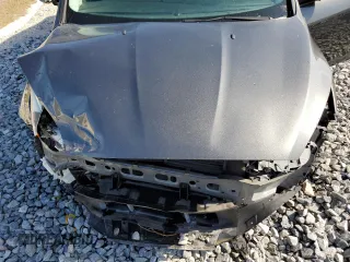 2018 Ford Focus SE with VIN 1FADP3F2XJL254344, listed as a Copart auction lot 54663115 with 84,850 mi miles and Salvage title. Bid and sale history available at DreamBid. Image 11.