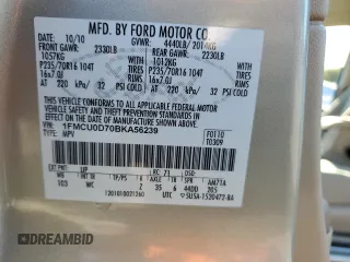 2011 Ford Escape XLT with VIN 1FMCU0D70BKA56239, listed as a Copart auction lot 69469464 with 59,782 mi miles and Salvage Title. Bid and sale history available at carsss.com. Image 12.