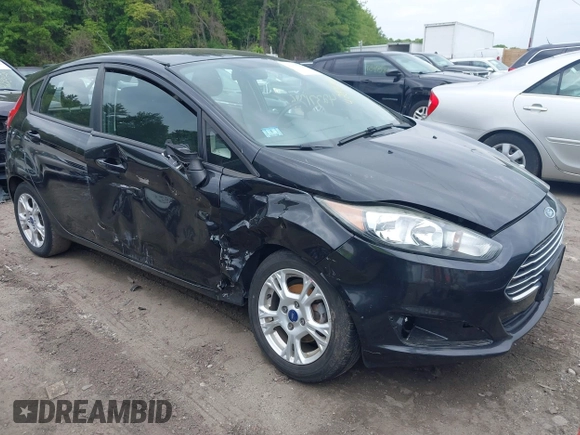 2014 Ford Fiesta SE z VIN 3FADP4EJ3EM205098, wystawiony jako IAAI lot #42371316 z przebiegiem 130 420 mil mil oraz . Historia ofert i sprzedaży dostępna na DreamBid. Obrazek 1.