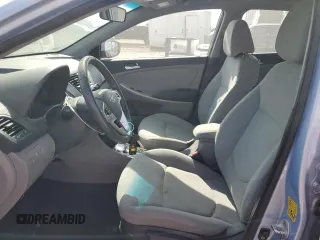 2012 Hyundai Accent SE with VIN KMHCU5AE3CU012287, listed as a Copart auction lot 60224945 with 62,583 mi miles and Salvage title. Bid and sale history available at DreamBid. Image 7.
