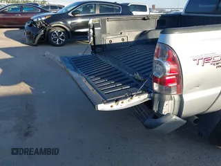 2009 Toyota Tacoma PreRunner with VIN 3TMJU62NX9M081748, listed as a IAAI auction lot 41608525 with 210,999 mi miles. Bid and sale history available at carsss.com. Image 17.