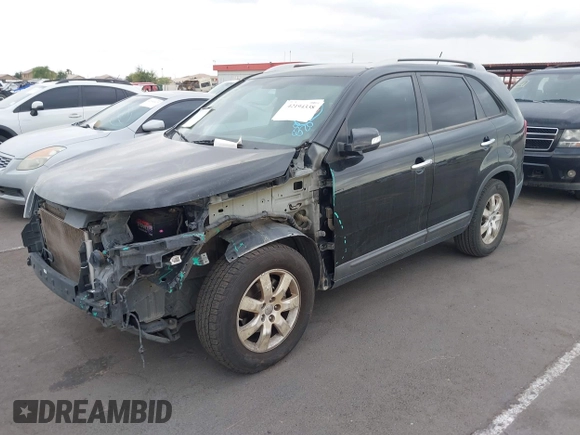2012 Kia Sorento LX with VIN 5XYKT3A6XCG247528, listed as a IAAI auction lot 42194338 with 123,565 mi miles and . Bid and sale history available at carsss.com. Image 2.