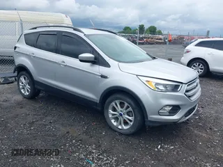 2018 Ford Escape SE с VIN 1FMCU0GD2JUC50470, выставлен на аукционе IAAI как лот 42172121 с пробегом 103 357 миль миль и . История ставок и продаж доступна на DreamBid. Изображение 1.