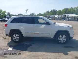 2012 Jeep Grand Cherokee Laredo with VIN 1C4RJFAG2CC176313, listed as a IAAI auction lot 42098127 with 162,556 mi miles. Bid and sale history available at carsss.com. Image 13.