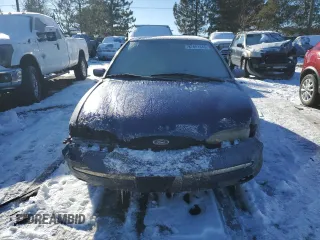 1995 Ford Contour z VIN 1FALP67L8SK186282, wystawiony jako Copart lot #87801845 z przebiegiem 81 611 mil mil oraz Szkody całkowita. Historia ofert i sprzedaży dostępna na DreamBid. Obrazek 5.