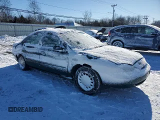 1999 Mercury Sable LS z VIN 1MEFM53S7XA603362, wystawiony jako Copart lot #88292545 z przebiegiem 93 776 mil mil oraz Nie do naprawy. Historia ofert i sprzedaży dostępna na DreamBid. Obrazek 4.