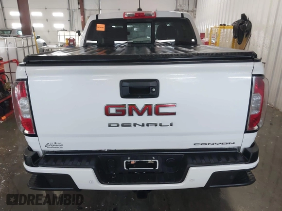 2021 GMC Canyon 4WD Denali with VIN 1GTG6EEN0M1229180, listed as a IAAI auction lot 41298304 with 55,865 mi miles. Bid and sale history available at carsss.com. Image 17.