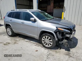 2016 Jeep Cherokee Overland z VIN 1C4PJMJSXGW300719, wystawiony jako Copart lot #58216665 z przebiegiem 128 016 mil mil oraz Szkoda całkowita • Salvage title. Historia ofert i sprzedaży dostępna na DreamBid. Obrazek 4.