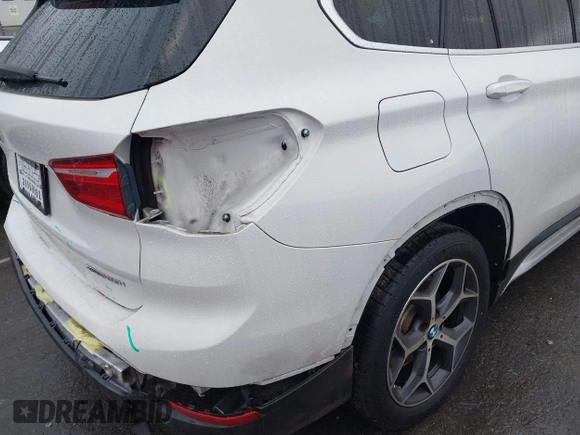 2019 BMW X1 xDrive28i with VIN WBXHT3C54K3H35641, listed as a IAAI auction lot 42241894 with 100,989 mi miles and . Bid and sale history available at DreamBid. Image 18.