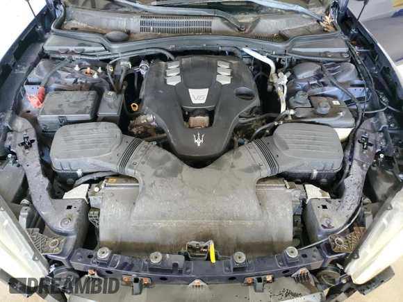 2015 Maserati Ghibli z VIN ZAM57XSA2F1159438, wystawiony jako Copart lot #52530965 z przebiegiem 73 996 mil mil oraz Szkoda całkowita • Salvage title. Historia ofert i sprzedaży dostępna na DreamBid. Obrazek 11.
