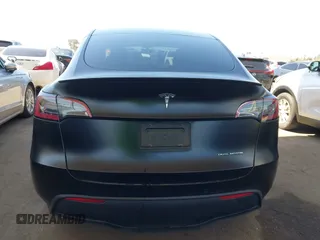 2022 Tesla Model Y Performance z VIN 7SAYGDEF0NF491586, wystawiony jako IAAI lot #42276747 z przebiegiem 117 203 mil mil oraz . Historia ofert i sprzedaży dostępna na DreamBid. Obrazek 16.