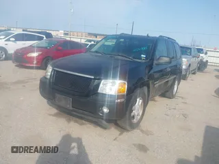2006 GMC Envoy SLT with VIN 1GKDS13S062234137, listed as a IAAI auction lot 41561864 with 221,031 mi miles. Bid and sale history available at carsss.com. Image 2.