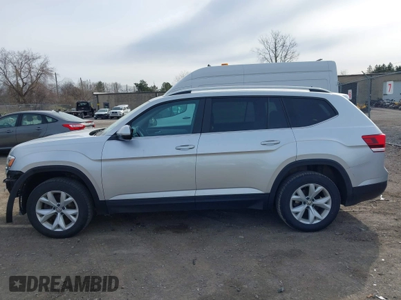 2018 Volkswagen Atlas SE with VIN 1V2KR2CA6JC560411, listed as a IAAI auction lot 41887472 with 168,155 mi miles and . Bid and sale history available at DreamBid. Image 15.