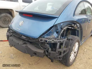2019 Volkswagen Beetle S with VIN 3VWFD7AT8KM708865, listed as a IAAI auction lot 41692756 with 35,070 mi miles. Bid and sale history available at carsss.com. Image 6.